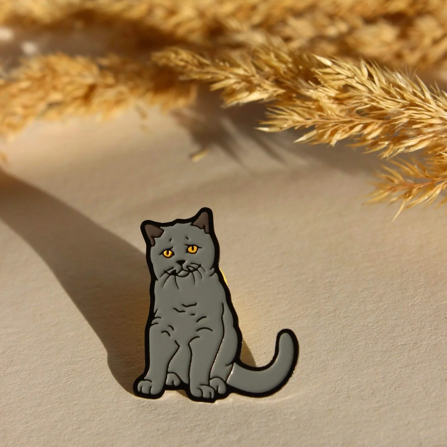 Значок Кіт сидить і дивиться