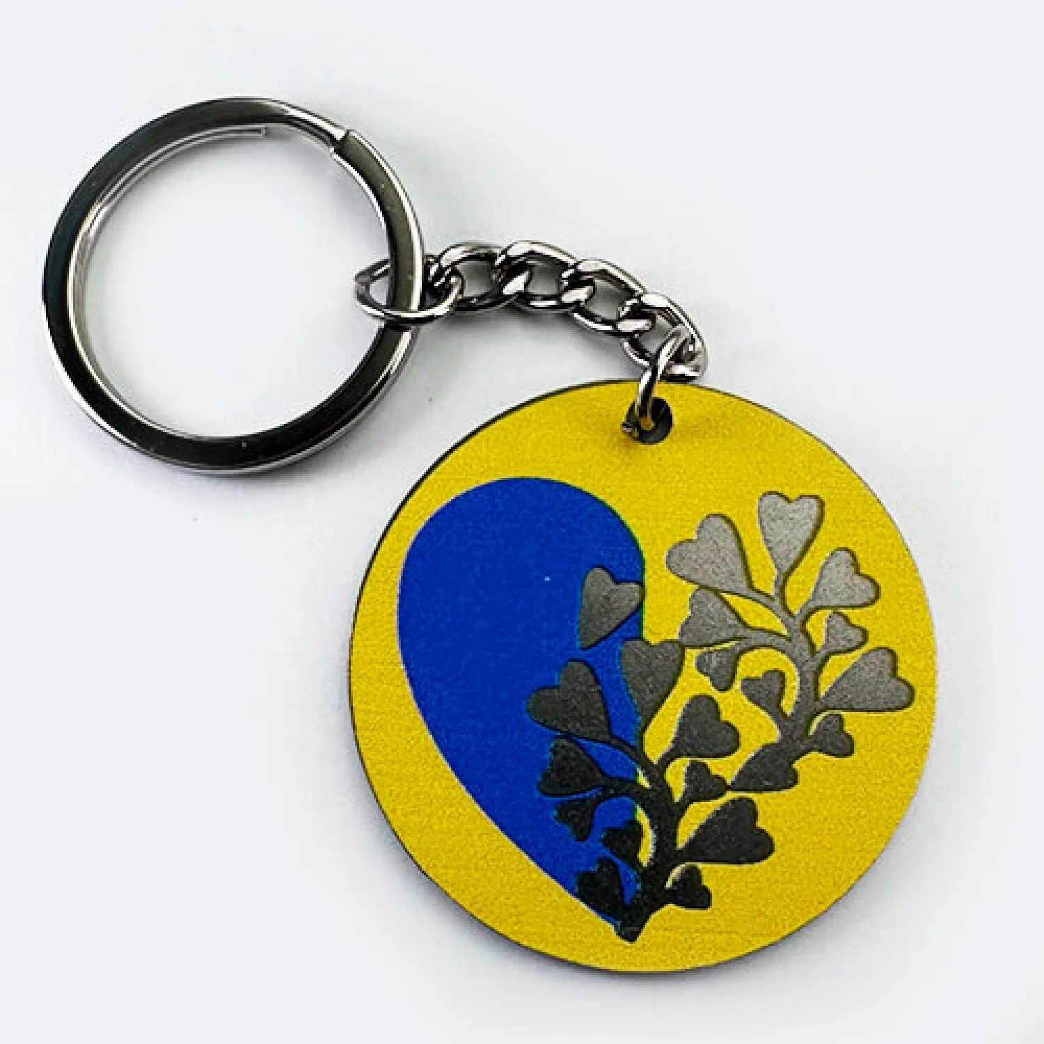 Брелок металевий з друком коло серце