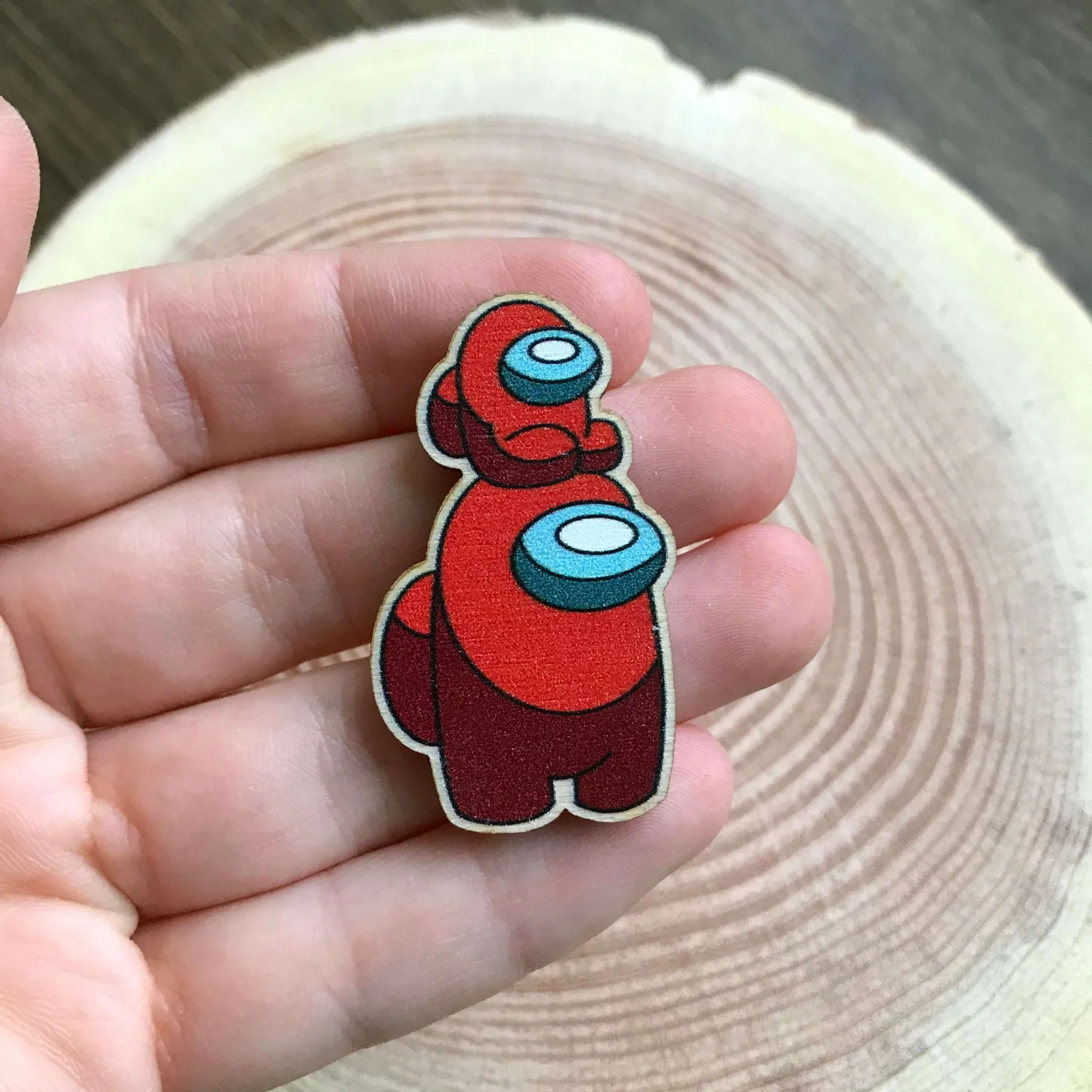 Значок Амонг с малышом