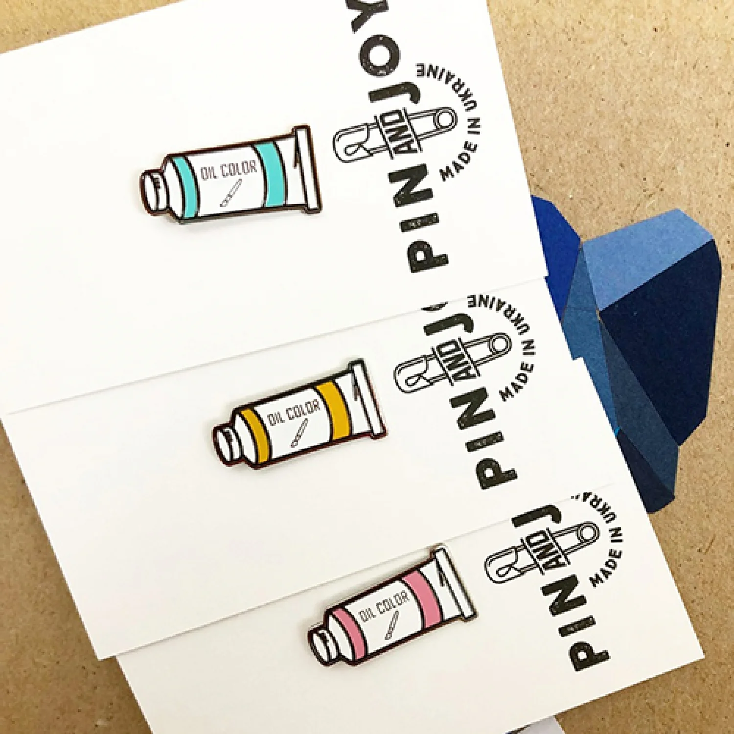 ЗНАЧОК ТЮБИК КРАСКИ ГОЛУБОЙ