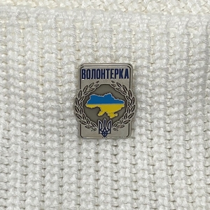 Значок Волонтерка