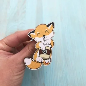 Значок лисеня з кавою